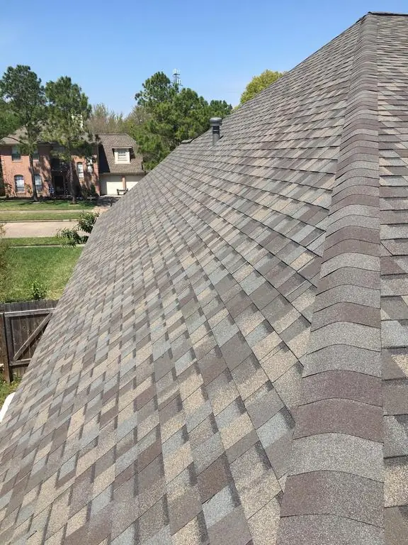 A completed shingle roof on a League City area home.